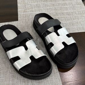 Used good condition Argentinian Stylish Black and Silver Sandals